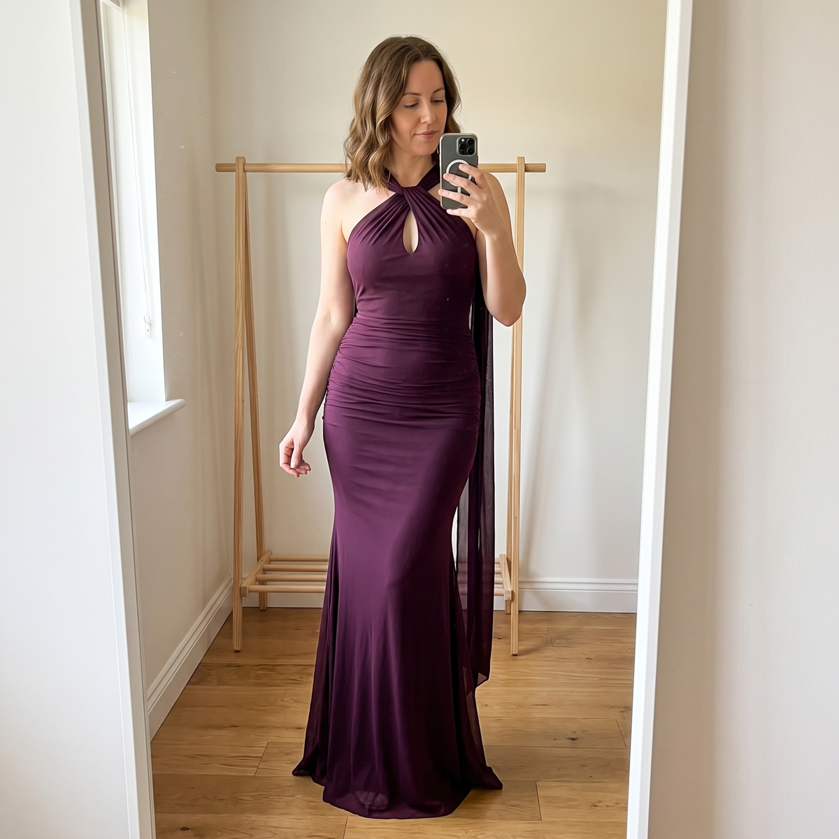 Burgundy Amara dress, model mirror styling photo